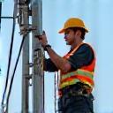 Technician working on telecom infrastructure